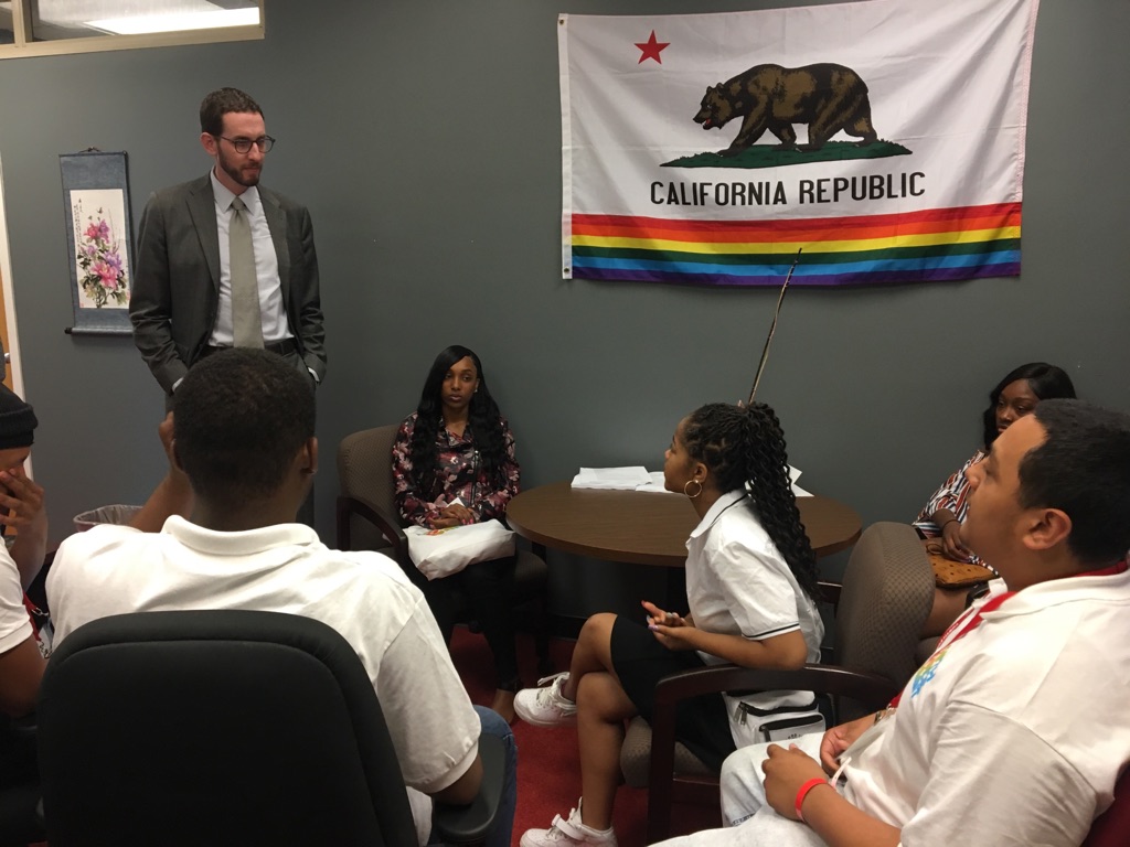 CJCJ's Maureen Washburn supports San Francisco youth in a meeting with their state representative, Senator Scott Weiner.